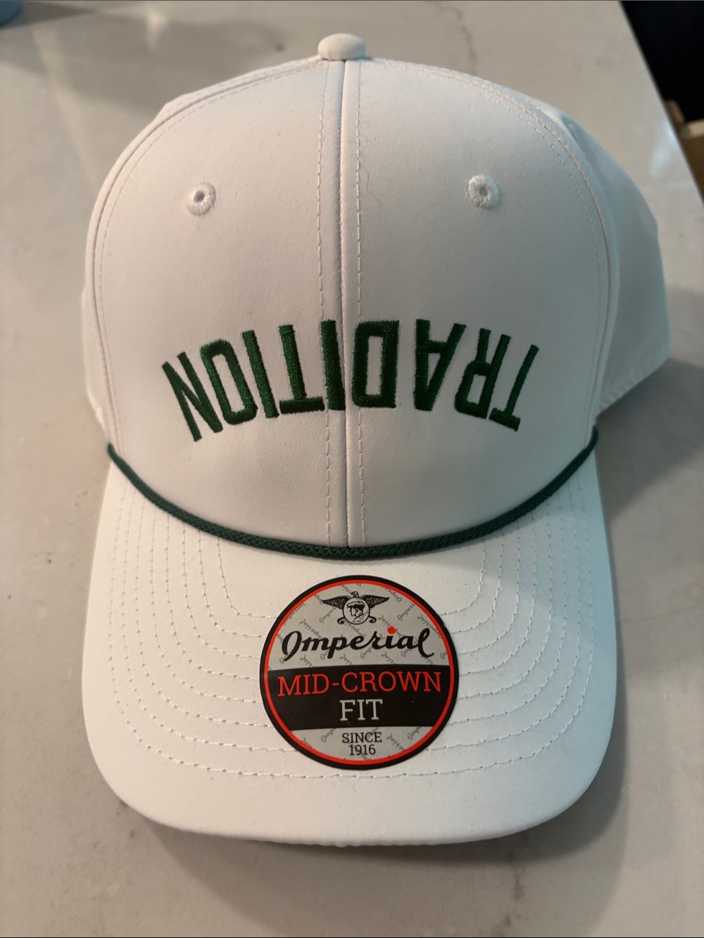 White Golf Cap with Green 'TRADITION' Embroidery